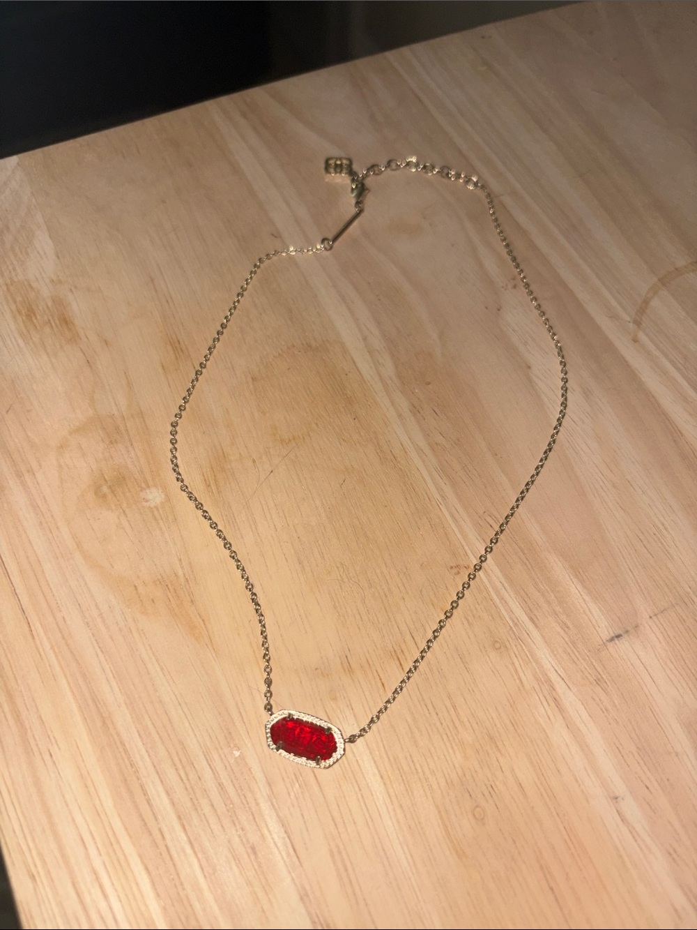 Kendra Scott Gold Necklace with Red Oval Stone